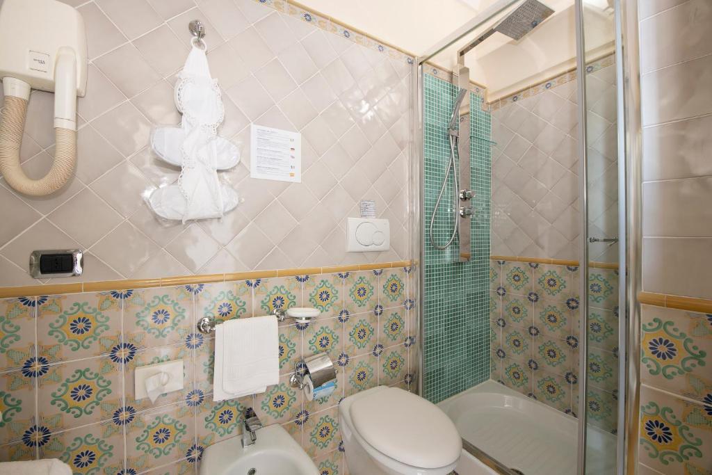 Koupelna v ubytování Amalfi Old Square room & apartments