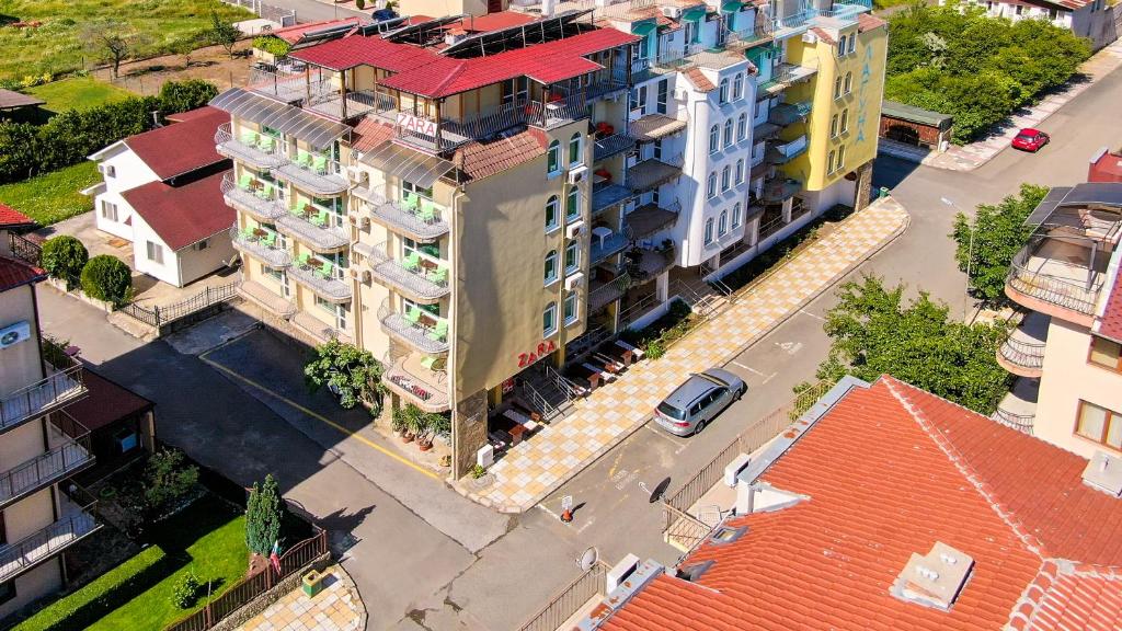 an overhead view of a city with tall buildings at Guest House Zara in Primorsko