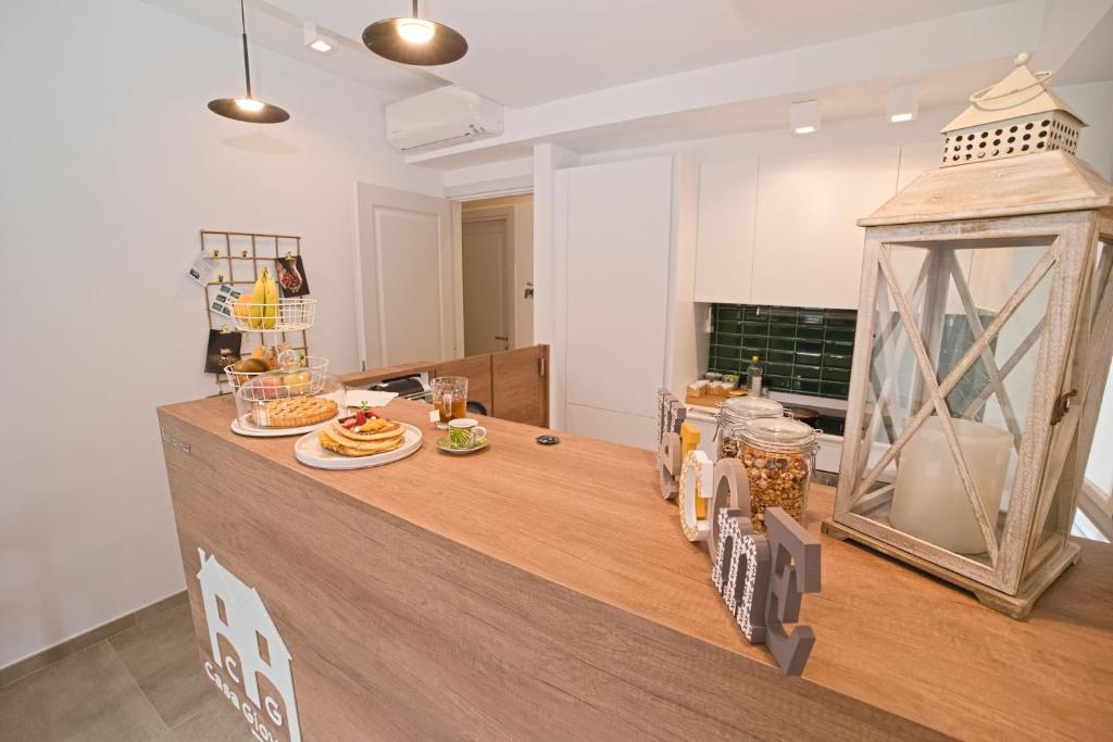 a kitchen with a counter with food on it at B&B CASA GIOVANNA in Campese