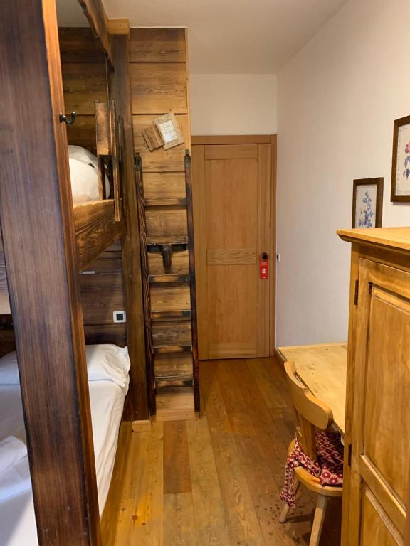Postel nebo postele na pokoji v ubytování Hotel Capriolo