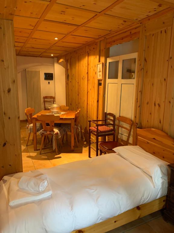 Postel nebo postele na pokoji v ubytování Hotel Capriolo