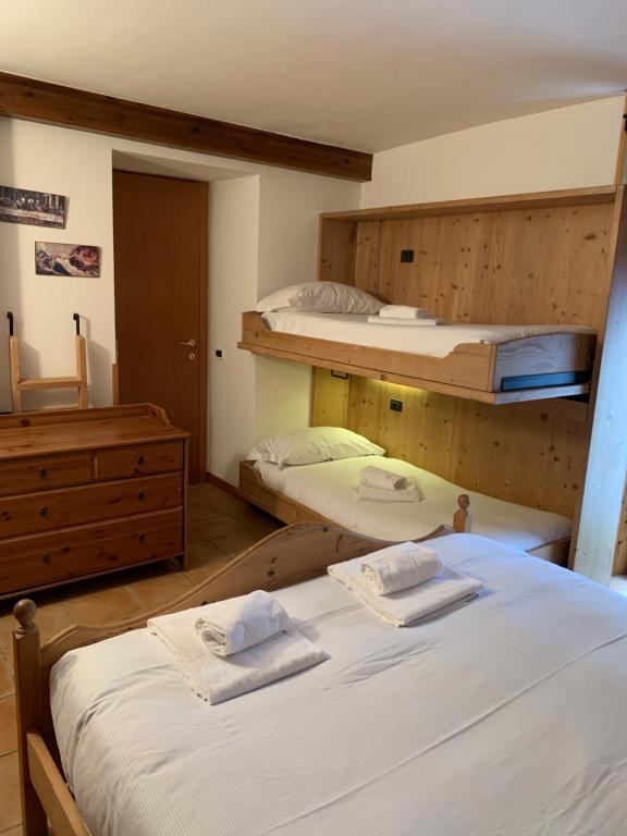 Postel nebo postele na pokoji v ubytování Hotel Capriolo