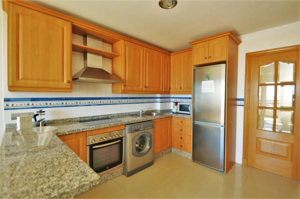 Kuchyňa alebo kuchynka v ubytovaní Excepcional Duplex al lado de la playa y con vistas al mar