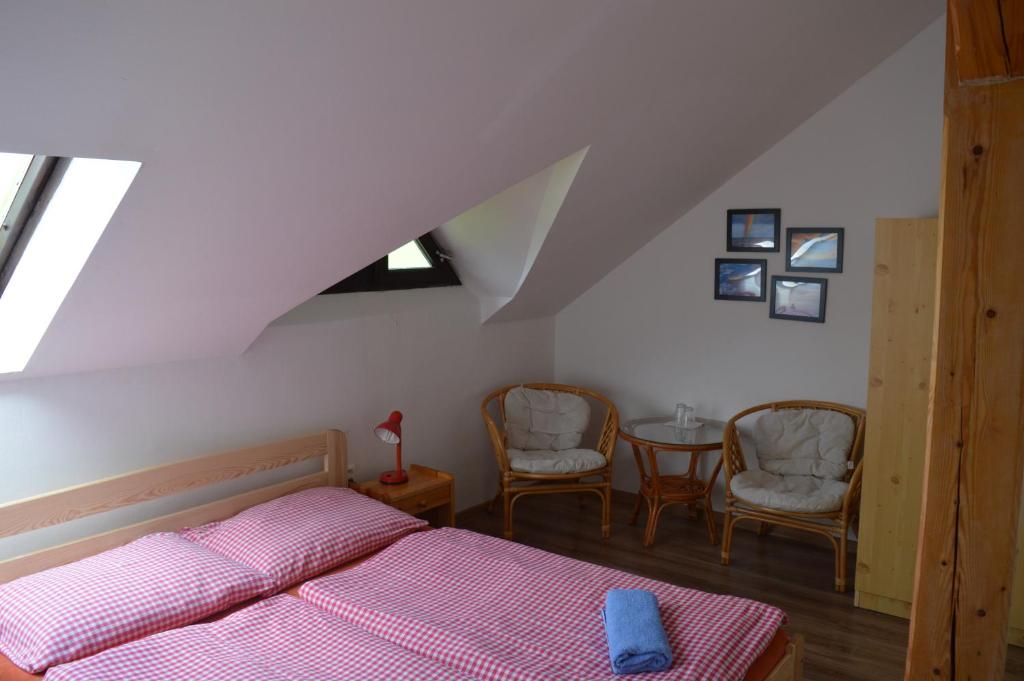 Postel nebo postele na pokoji v ubytování Chata Nová Seninka