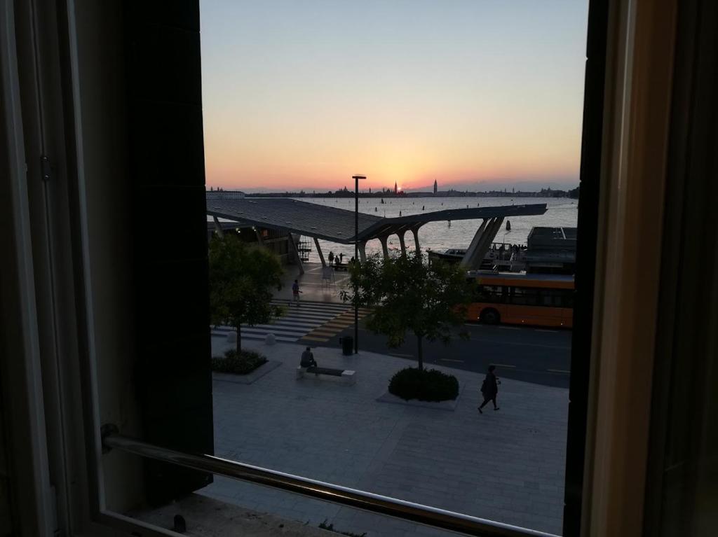 a view from a window of a city with a bus at Hotel Belvedere in Venice-Lido