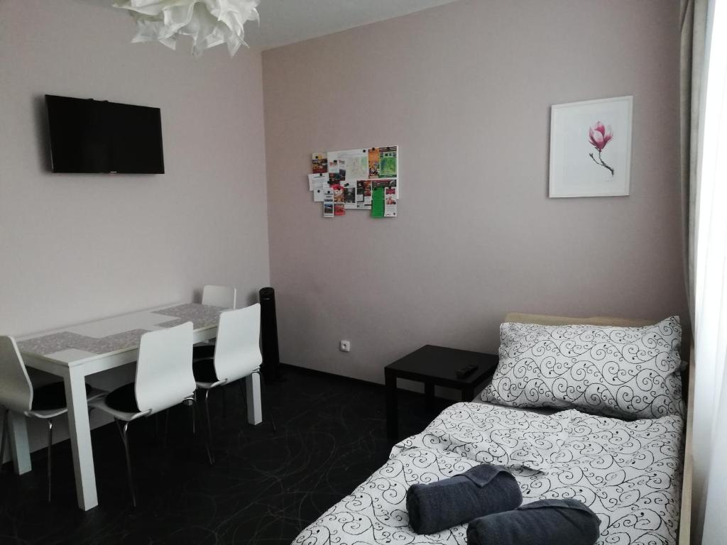 Posteľ alebo postele v izbe v ubytovaní Apartmán Lednická