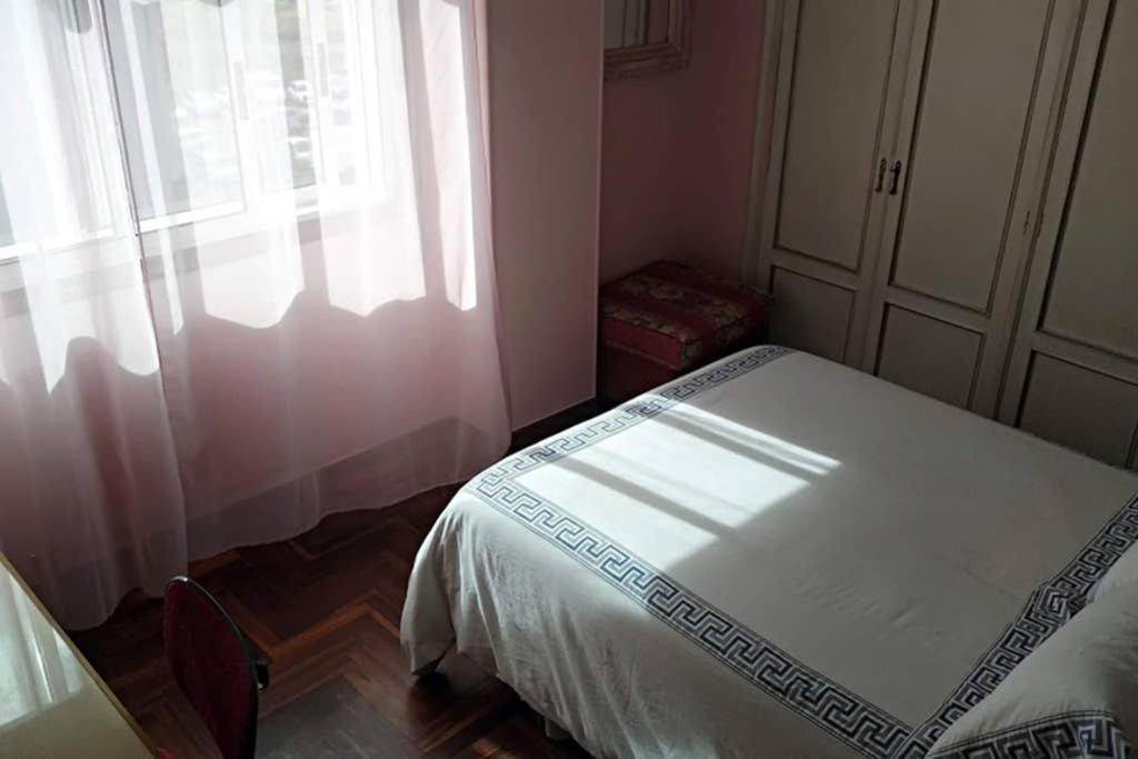 Posteľ alebo postele v izbe v ubytovaní Vivienda 3 dormitorios zona Balaídos-Pza. América