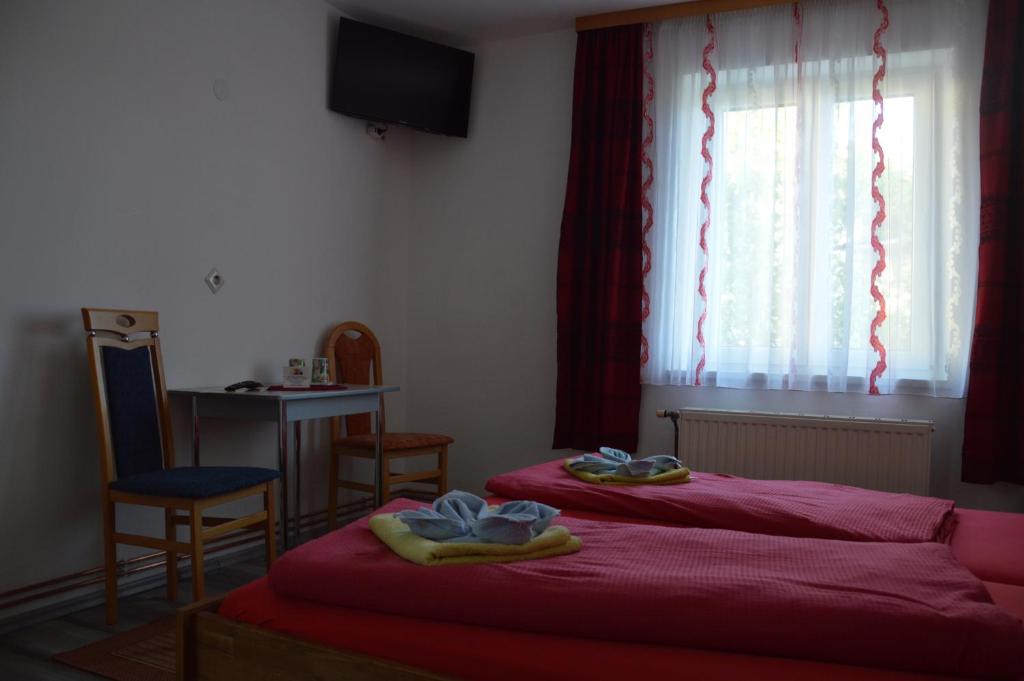Postel nebo postele na pokoji v ubytování Pension Hrnjic