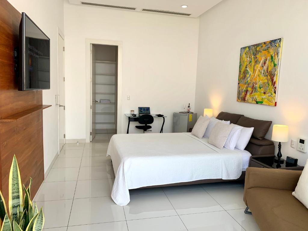 Postel nebo postele na pokoji v ubytování Casa Las Peñas Siglo XXI B&B