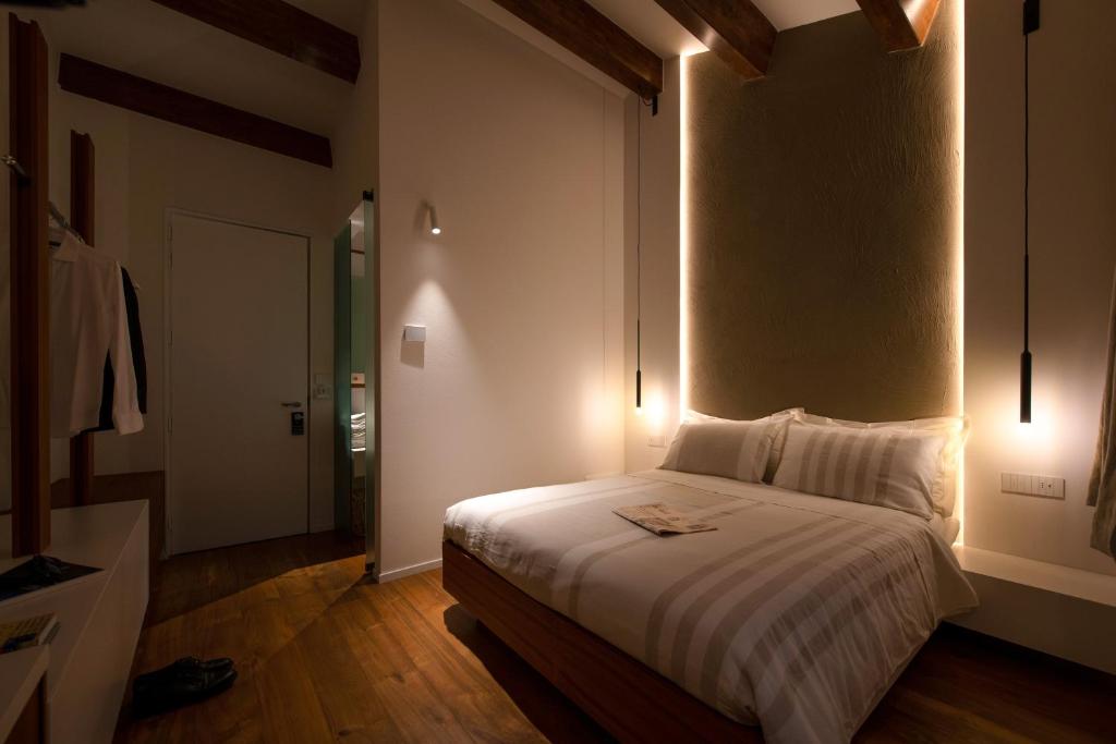 Postel nebo postele na pokoji v ubytování Locanda Remare