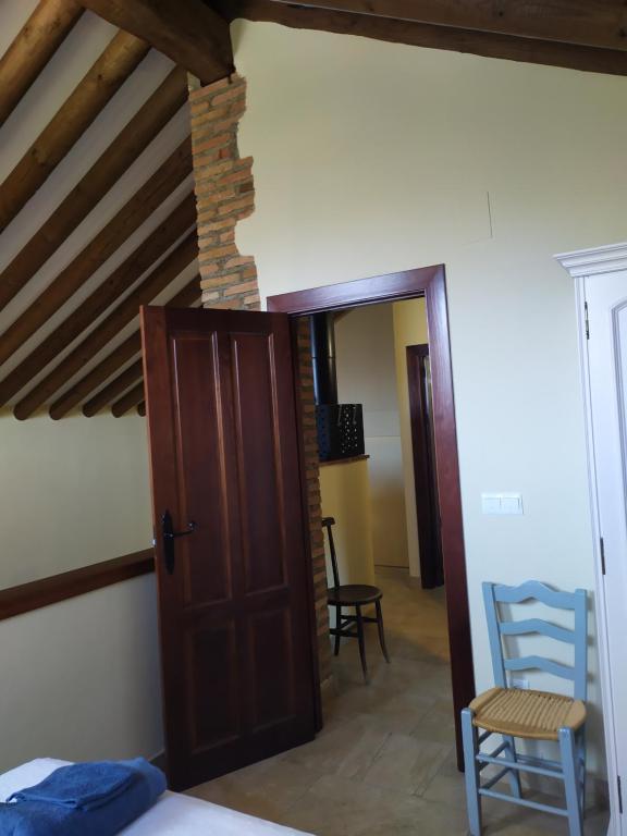 Postel nebo postele na pokoji v ubytování Cortijo Don Enrique