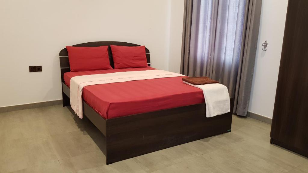 Postel nebo postele na pokoji v ubytování Taj Residence