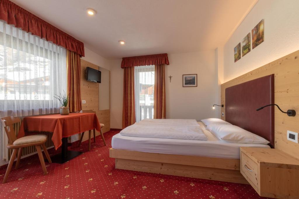 Postel nebo postele na pokoji v ubytování B&B Apartments La Palsa