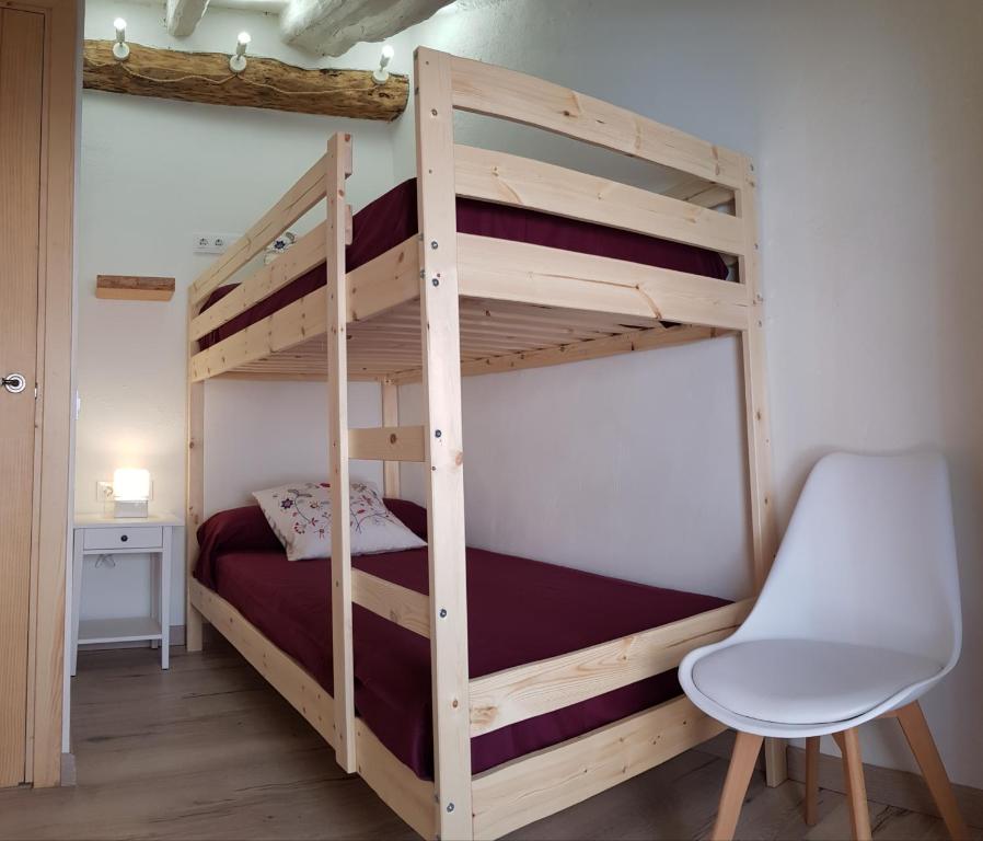 Postel nebo postele na pokoji v ubytování Cal Moreno