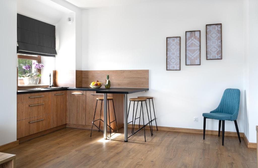 Kuchyň nebo kuchyňský kout v ubytování Apartamenty, Boutique Rooms Villa 82, MIEJSCE PRKINGOWE
