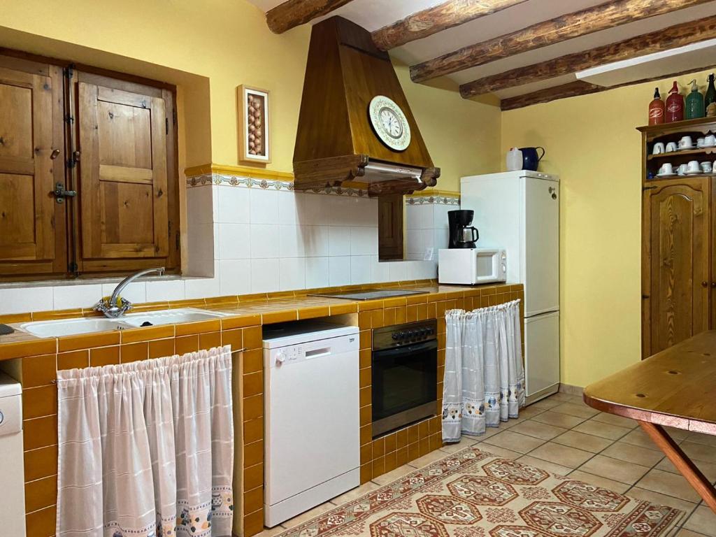 Kuchyň nebo kuchyňský kout v ubytování Casa Gely