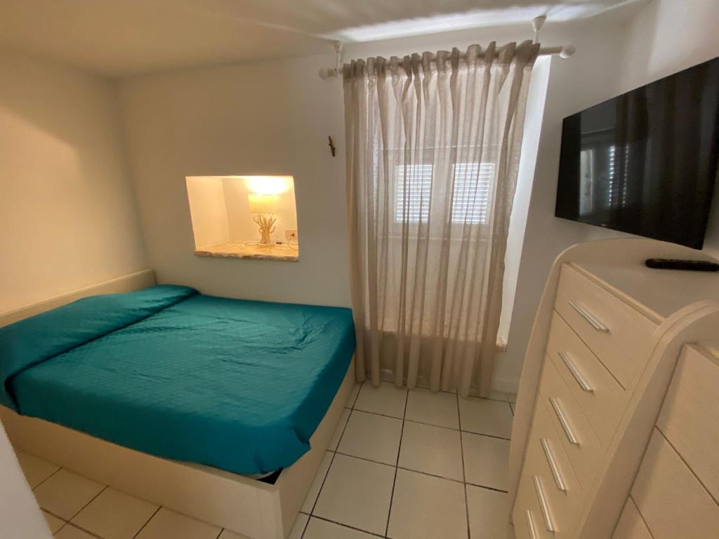 Postel nebo postele na pokoji v ubytování Casa Valga Ponza
