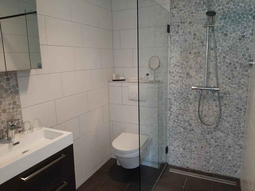Koupelna v ubytování B&B De Reede