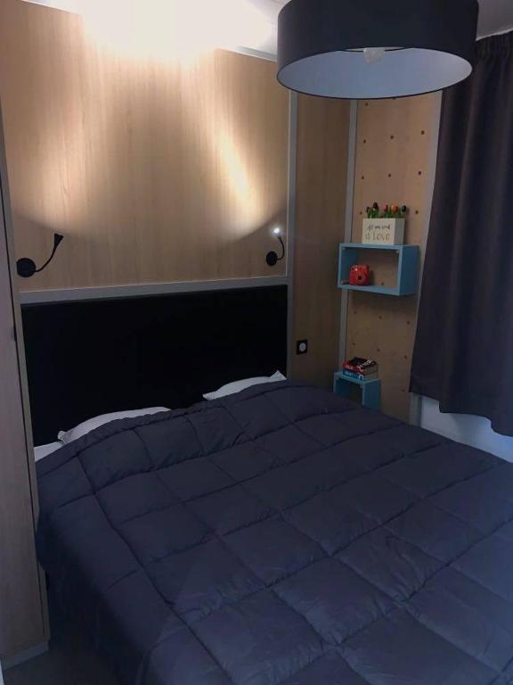 Postel nebo postele na pokoji v ubytování Camping U Libecciu