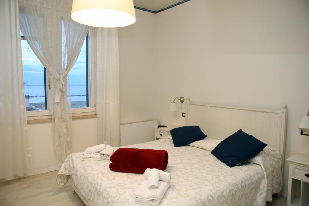 Postel nebo postele na pokoji v ubytování Hotel La Torre
