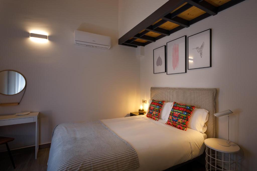 Postel nebo postele na pokoji v ubytování Apartamentos Turísticos Huerto El Horno