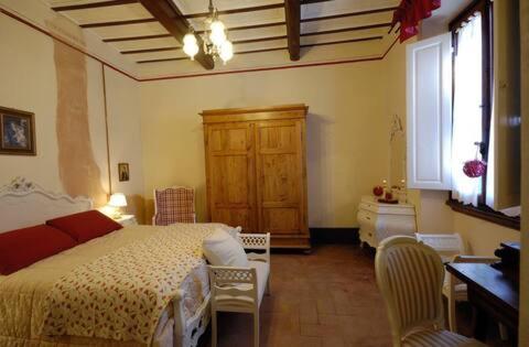 Postel nebo postele na pokoji v ubytování B&B Cimamori