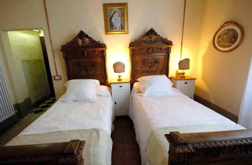 Postel nebo postele na pokoji v ubytování B&B Cimamori