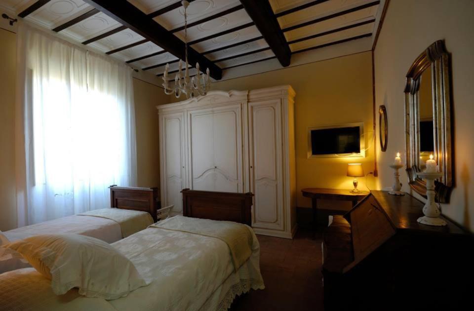 Postel nebo postele na pokoji v ubytování B&B Cimamori