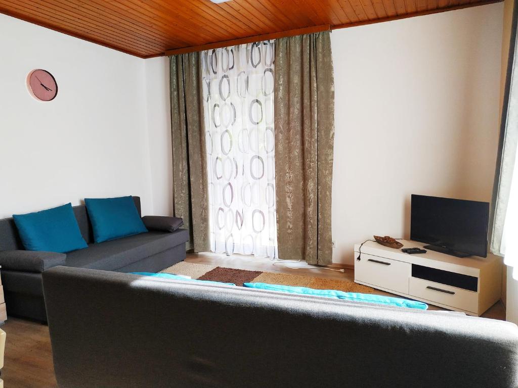 Televízia a/alebo spoločenská miestnosť v ubytovaní Apartmenthaus Kestel