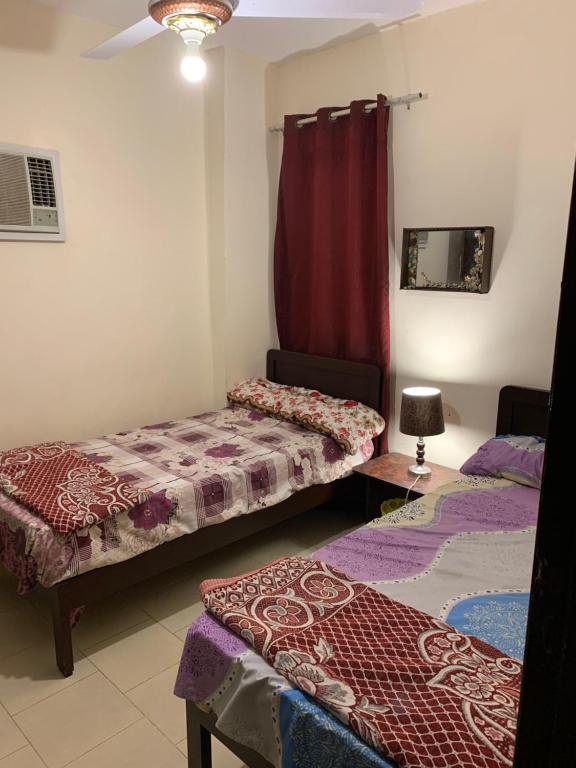 A bed or beds in a room at Chalet in Belagio Ain Sokhna
