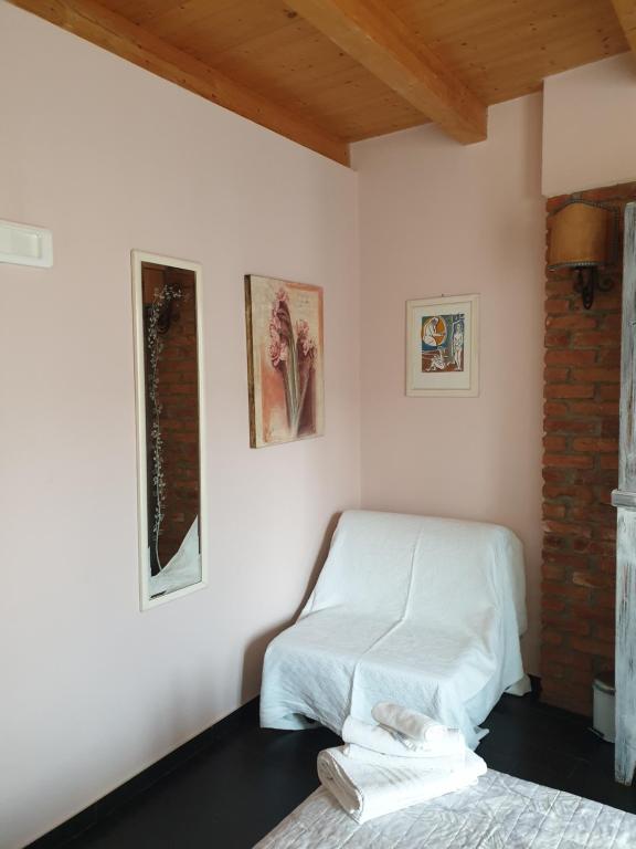 Postel nebo postele na pokoji v ubytování B&B Il Rustico