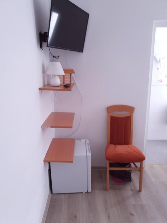 TV a/nebo společenská místnost v ubytování Guesthouse Osvald