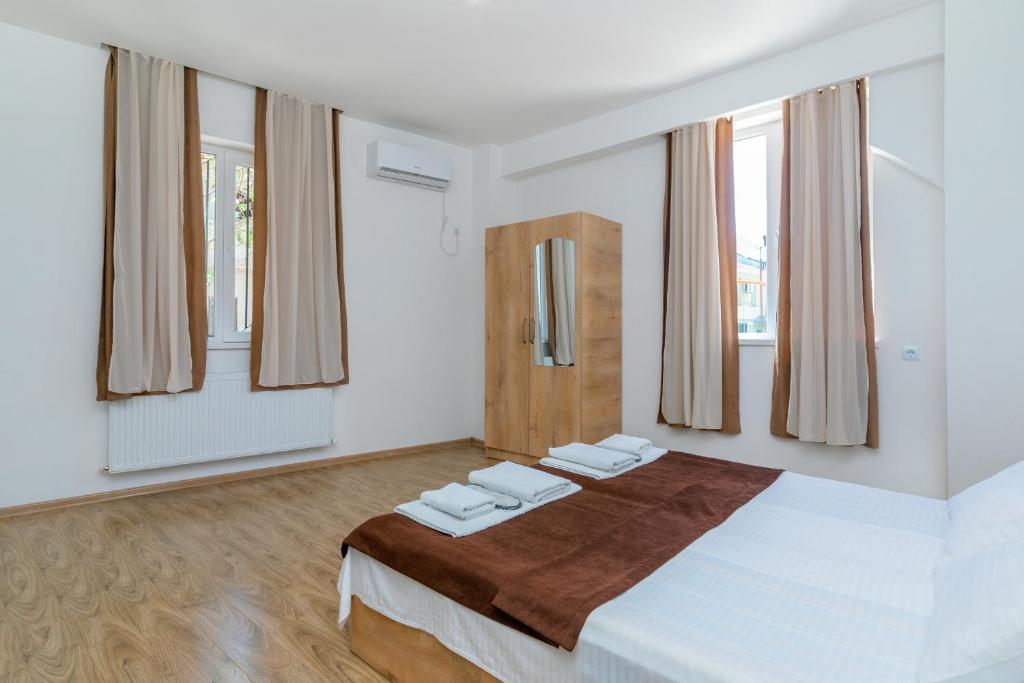 Postel nebo postele na pokoji v ubytování Hotel Continental