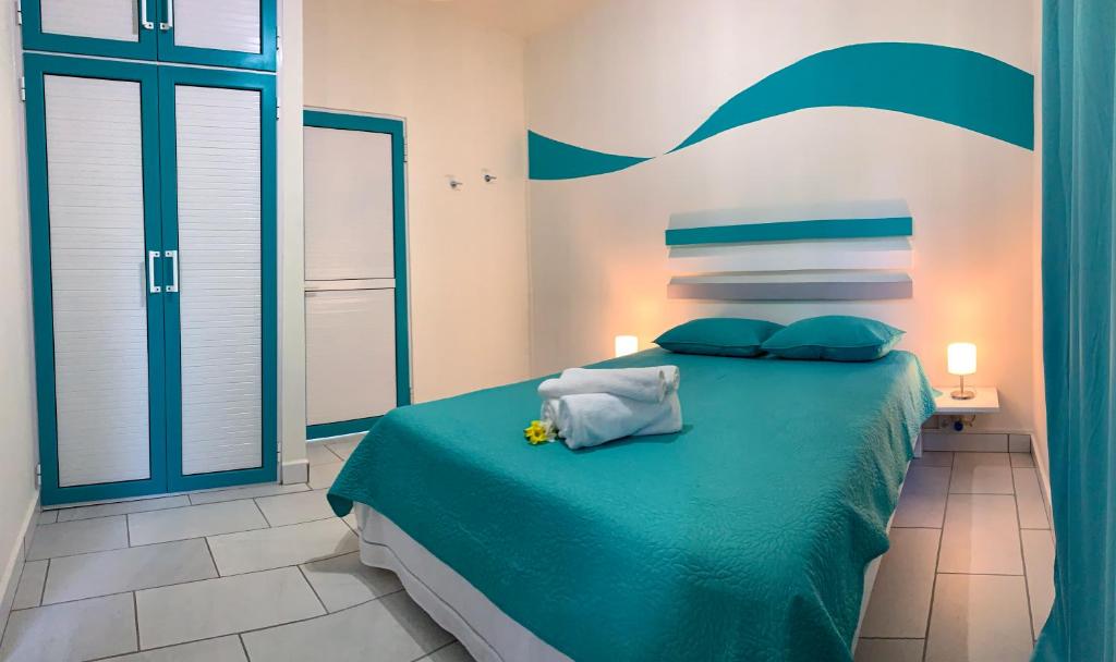 Postel nebo postele na pokoji v ubytování Abiki Mauritius