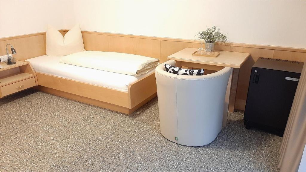 Postel nebo postele na pokoji v ubytování Hotel Garni Bergland