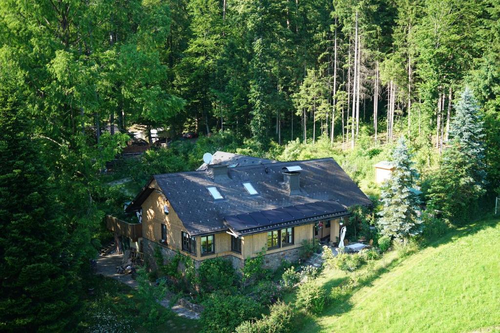 an aerial view of a house in the woods at Landhaus Zirknitz in Sankt Stefan ob Stainz