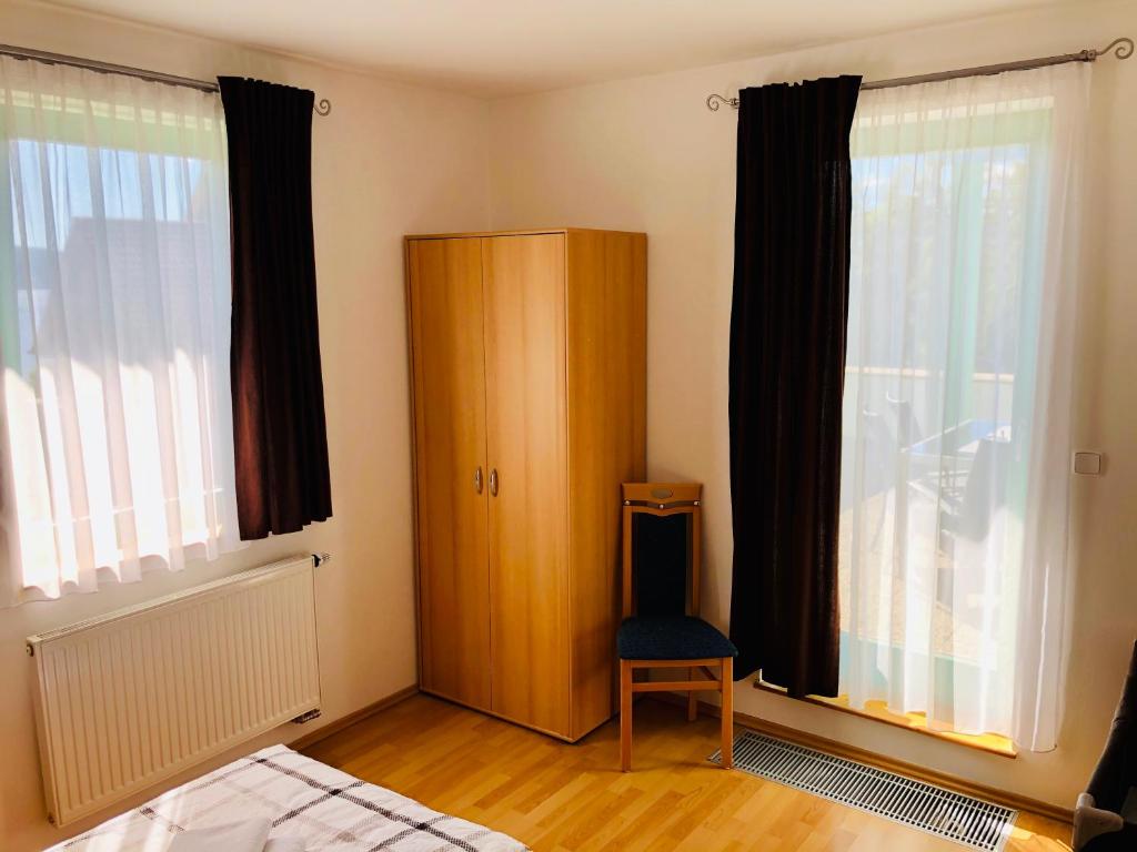 Postel nebo postele na pokoji v ubytování Apartmán Adam