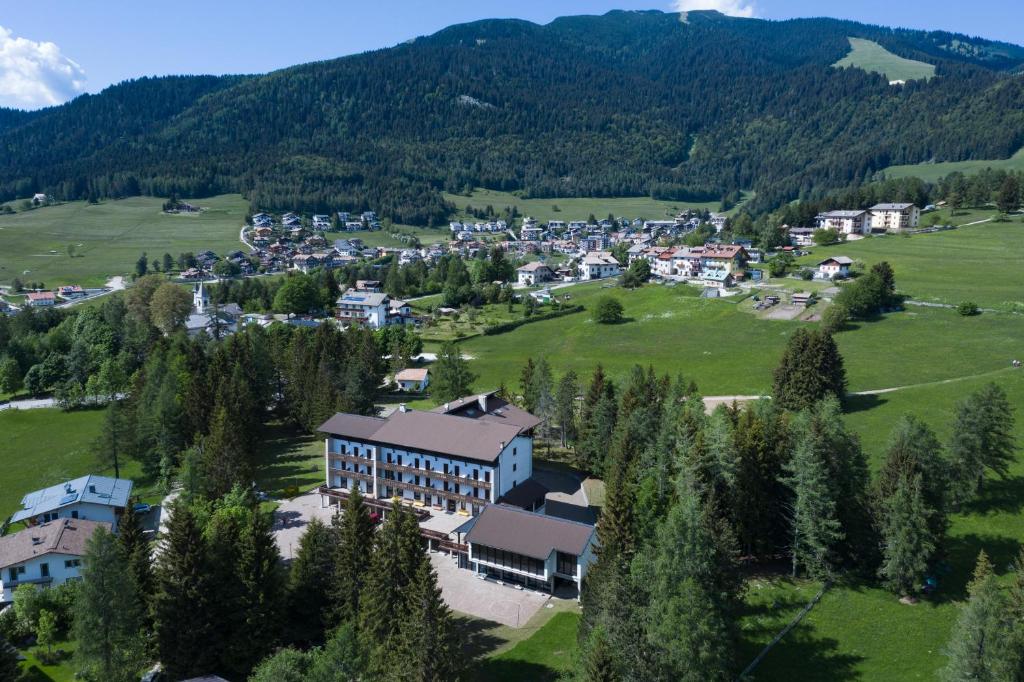 an aerial view of a small town in the mountains at Casa Santa Maria in Folgaria
