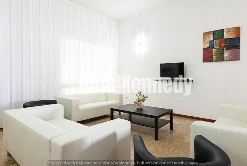 TV a/nebo společenská místnost v ubytování Hotel Kennedy
