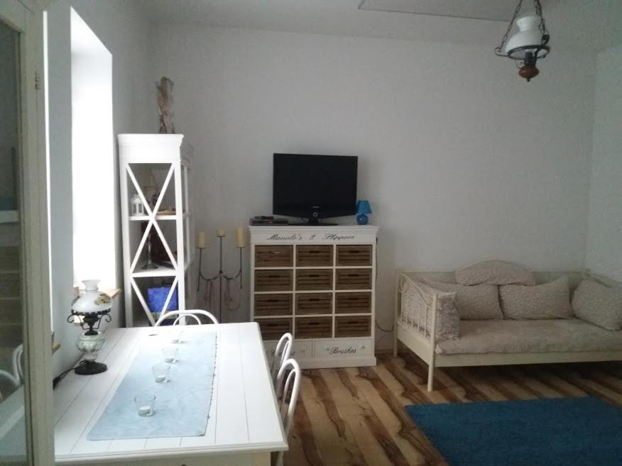 TV a/nebo společenská místnost v ubytování Kőfejtő háza