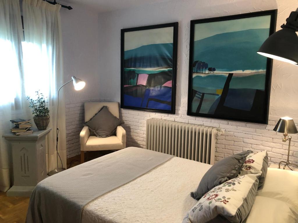 Postel nebo postele na pokoji v ubytování Hostal Arostegui