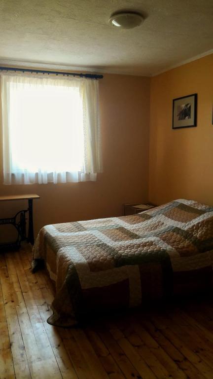 Postel nebo postele na pokoji v ubytování Viesu nams Klāņas