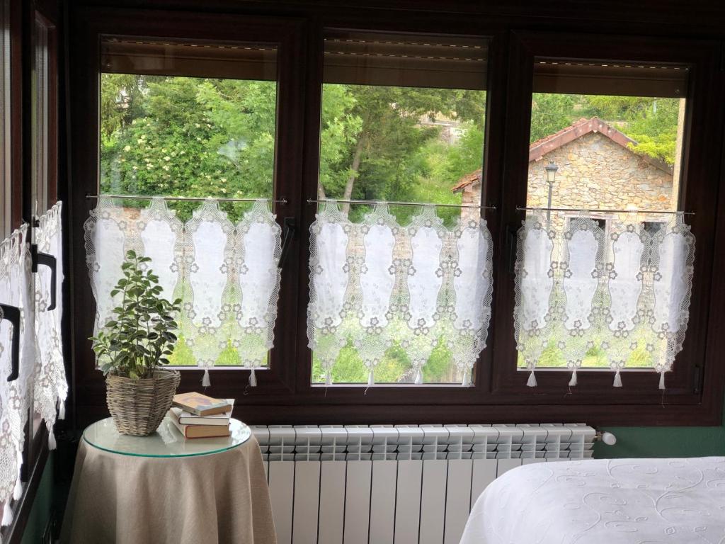 Postel nebo postele na pokoji v ubytování Hostal Arostegui