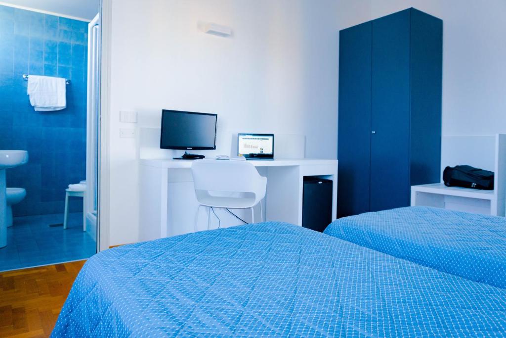 Posteľ alebo postele v izbe v ubytovaní Hotel Mistral