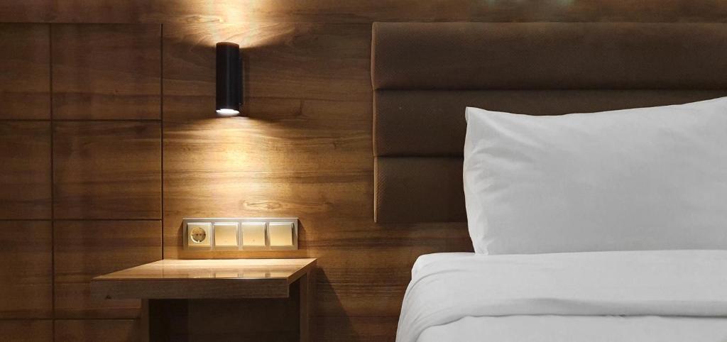 Postel nebo postele na pokoji v ubytování Ozgur Bey Spa Hotel