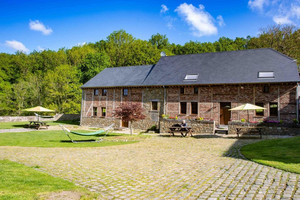 Zahrada ubytování B&B Ferme de Leuze Rustieke Gîtes nabij Durbuy, eigen laadpalen
