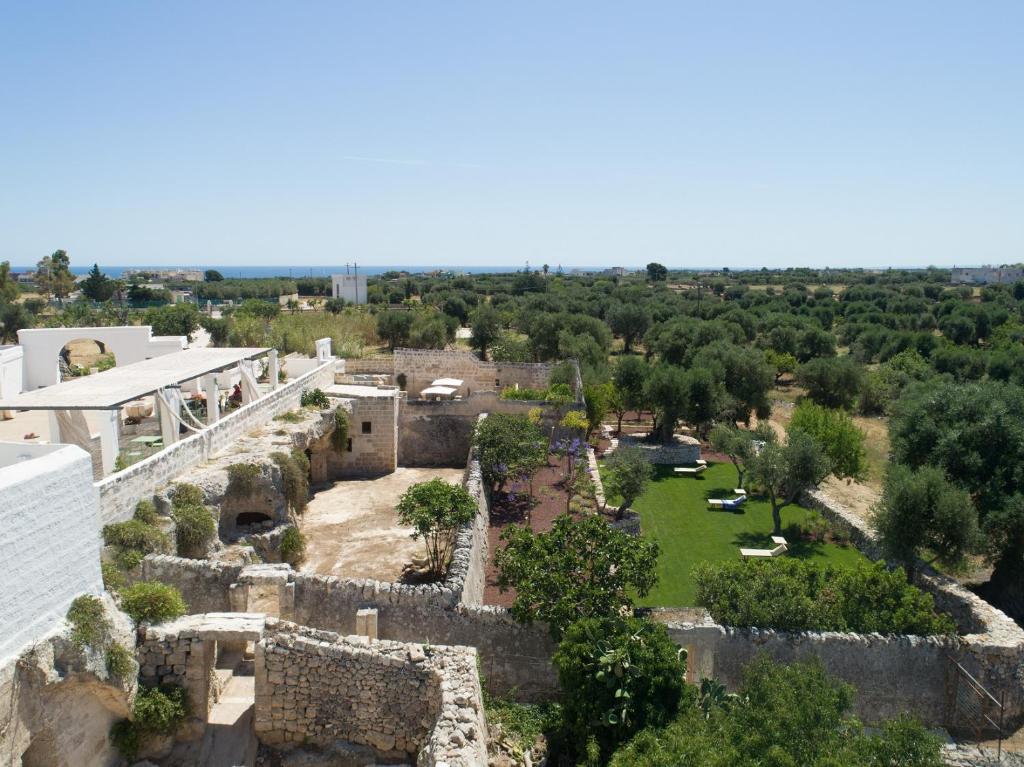 an aerial view of the ruins of a castle at Masseria D'Erchia in Monopoli