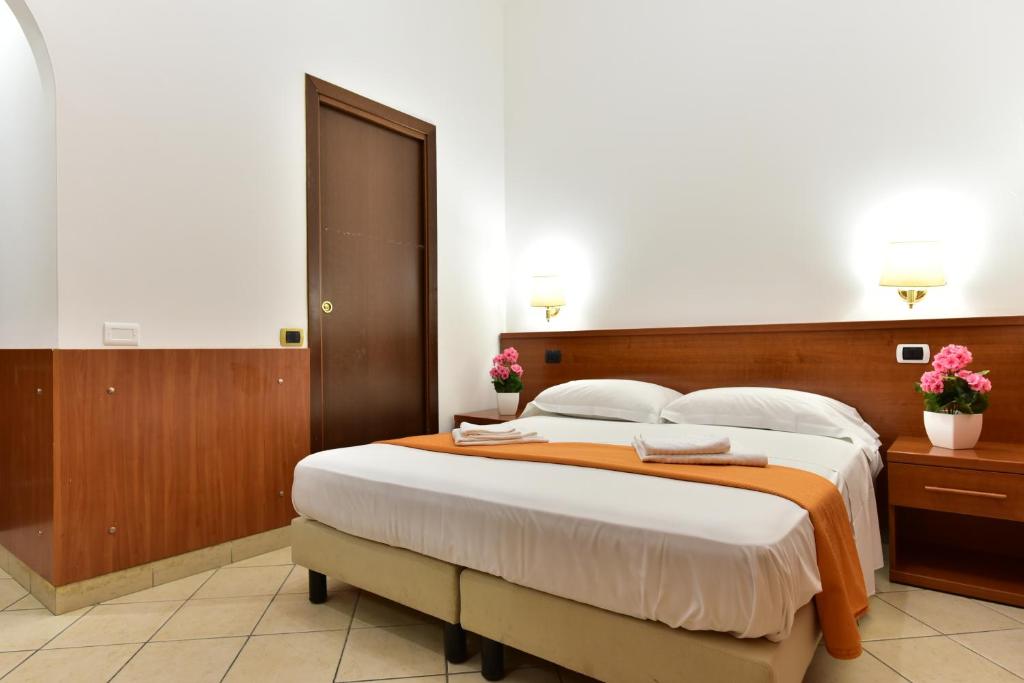 Posteľ alebo postele v izbe v ubytovaní B&B Termini