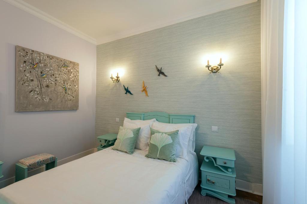 Postel nebo postele na pokoji v ubytování Quinta da Tapada
