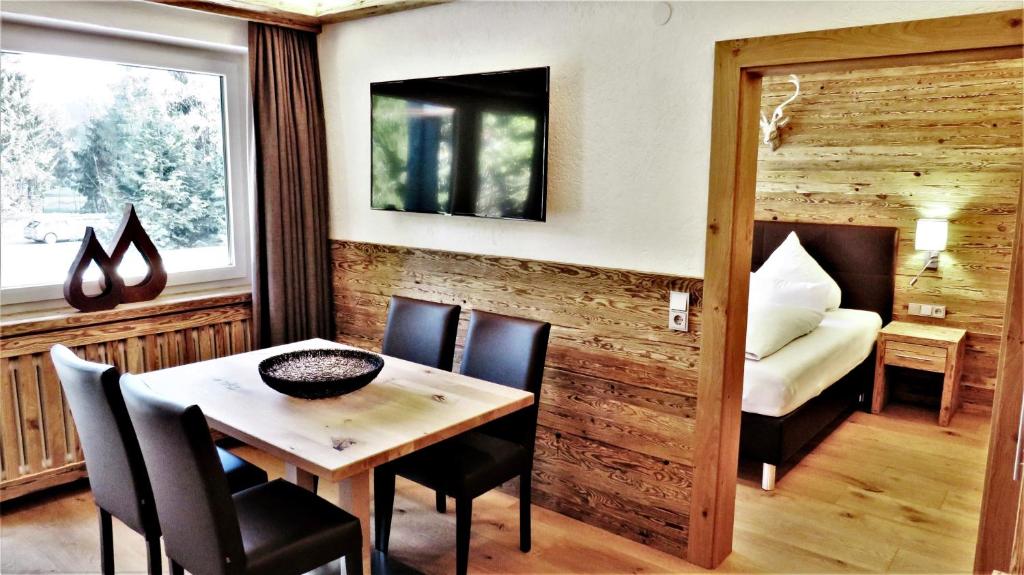 Postel nebo postele na pokoji v ubytování Almhof Kitzlodge - Alpine Lifestyle Hotel